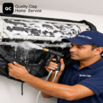 Technician servicing air conditioner at home – Quality Clap AC repair